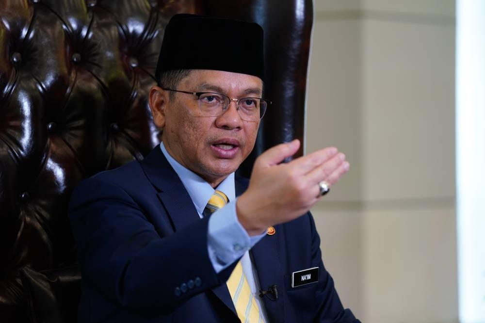 Minister in the Prime Minister's Department (Religious Affairs) Datuk Dr Mohd Na'im Mokhtar said until August 2023, more than 45 per cent of the total 18 million Muslims in the country have opened a TH account. - Photo by MOHD HALIM ABDUL WAHID
