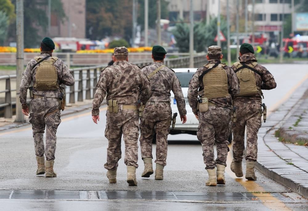 Members of Turkish Police Special Forces secure the area near the Interior Ministry following a bomb attack in Ankara, on Oct 1, 2023, leaving two police officers injured. - (Photo by ADEM ALTAN / AFP)