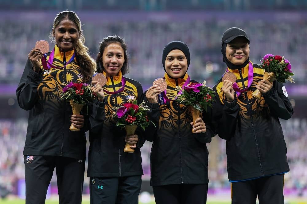 
The women’s quartet comprising Azreen Nabila Alias, Zaidatul Husniah Zulkifli, Nur Afrina Batrisyia Mohamad Rizal and Shereen Samson Vallabouy, were promoted to third place (bronze) after the Bahrain quartet which finished third initially was disqualified for a lane infringement - FILE PIX 