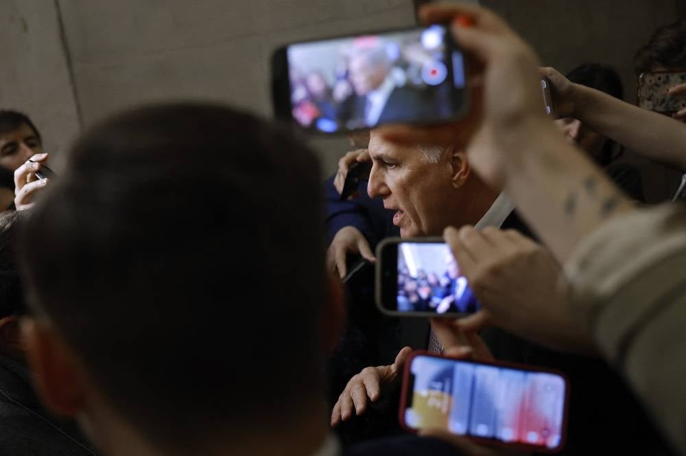 Congressman Kevin McCarthy after being the first Speaker to be ousted in the House of Representatives talks to reporters outside his office in the US Capitol on Oct 2, 2023 in Washington, DC - AFP