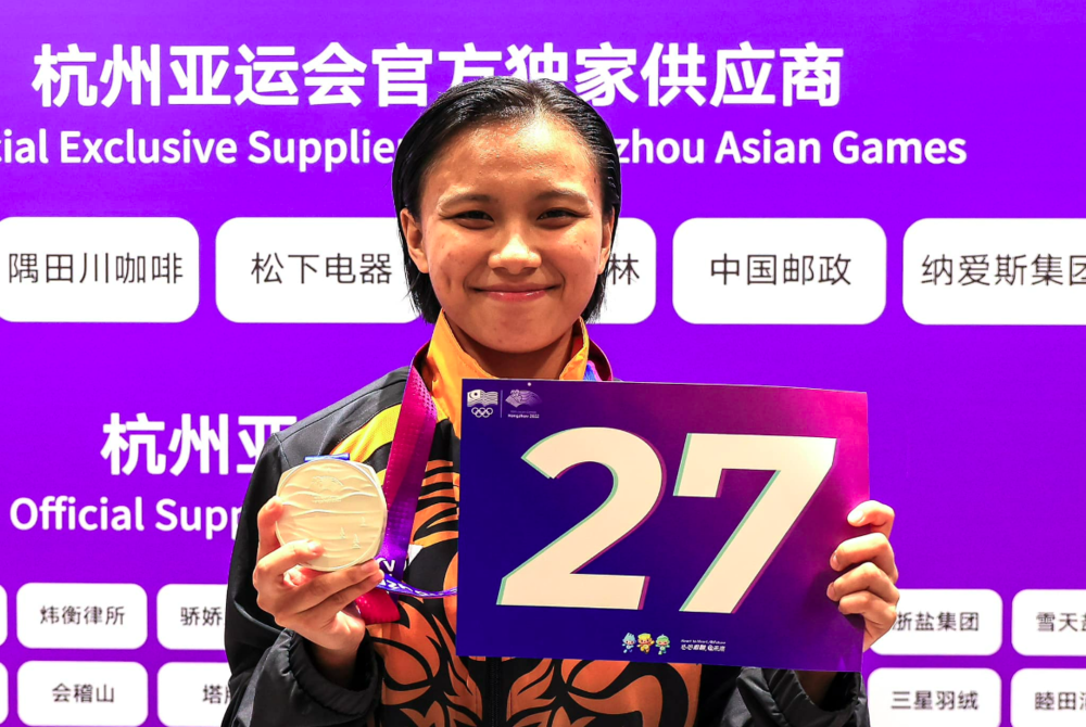 Young karate exponent Lovelly Anne Robberth who ended the country’s 13-year wait for a medal from karate, could not hold back her tears after dedicating the silver medal she had won, to her late mother Adriana Pamela Sundangit. - Facebook