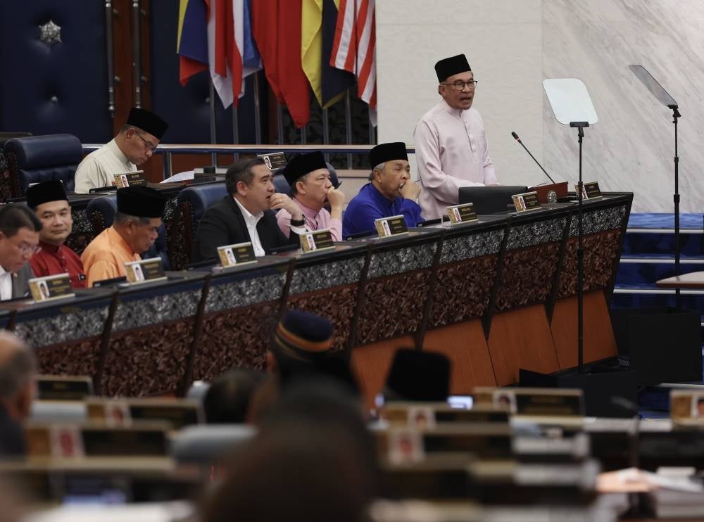 Finance Minister Datuk Seri Anwar Ibrahim during the tabling of Budget 2024 in Parliament, today. - Photo by Bernama