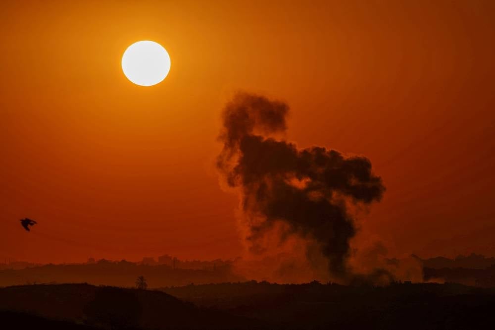 A picture taken from the southern Israeli side of the border with the Gaza Strip on Oct 15. - Photo by AFP