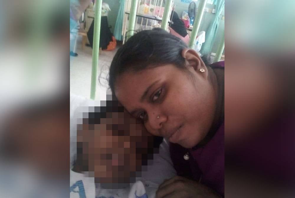Ana with her son, Navin who is being treated at HSA, Johor Bahru.