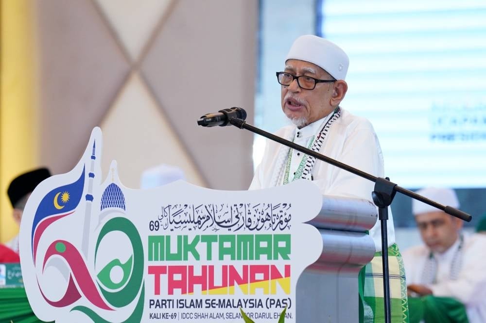 Hadi speaking at the 69th Pas Muktamar at IDCC. Photo by Mohd Halim Abdul Wahid/Sinar