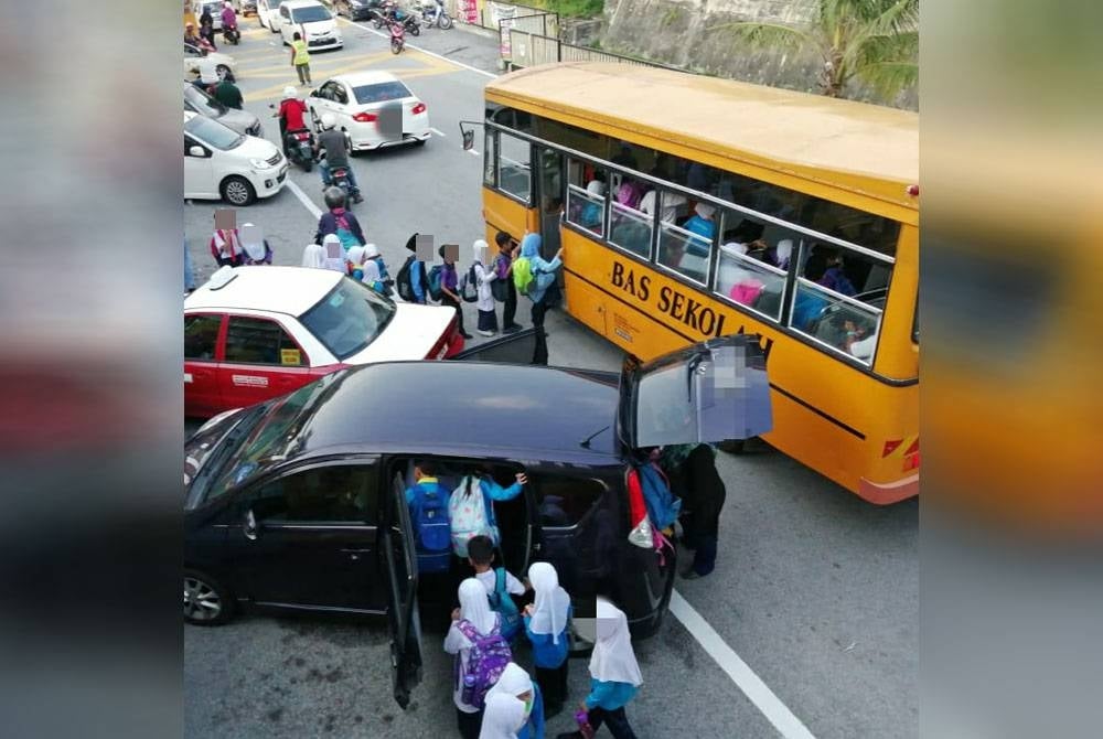 A licensed bus transporting the students and illegal transportation picking up students.