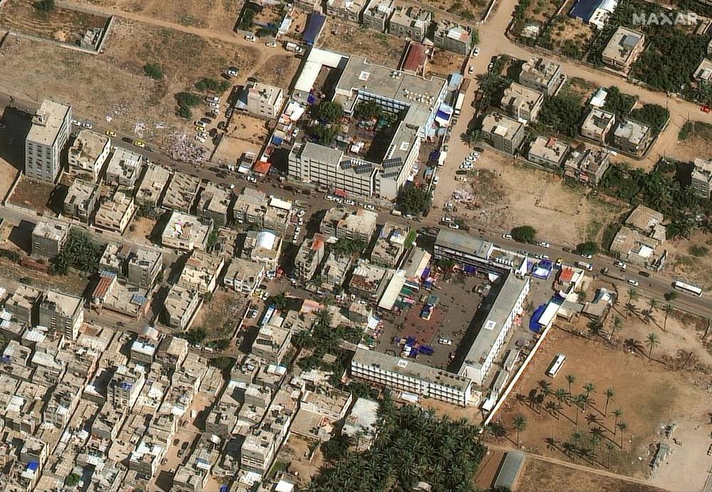 This handout satellite picture courtesy of Maxar Technologies taken on October 19, 2023, shows people sheltering at school along Akkela street in Gaza City. Photo by Satellite image 2023 Maxar Technologies/ AFP