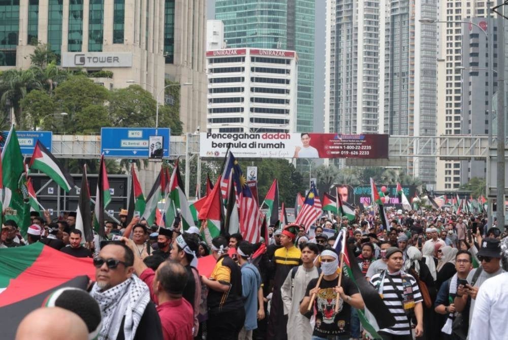 Hundreds of people gathered at the Solidarity with Gaza and Palestine Rally in Kuala Lumpur today. - Photo: FACEBOOK