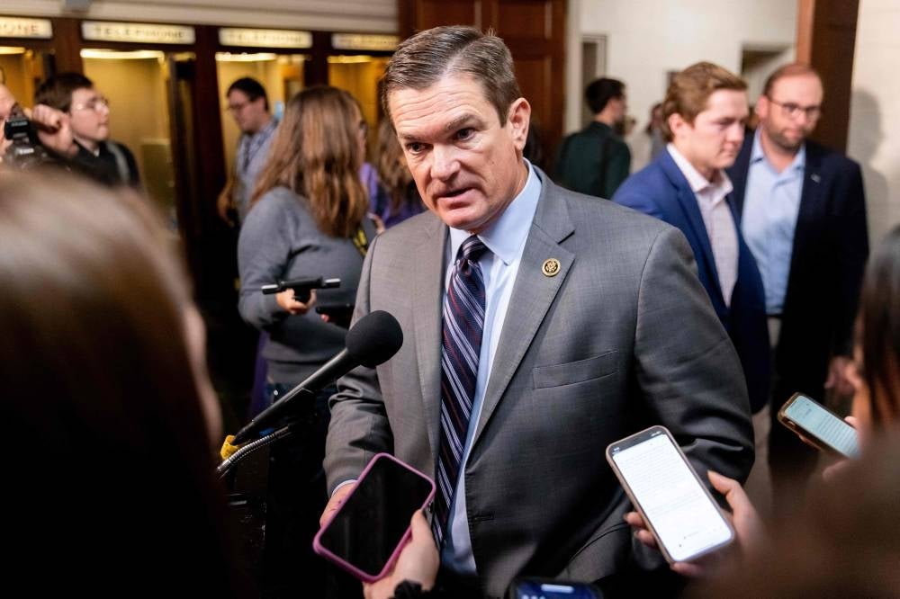 US Representative Austin Scott (R-TX) speaks with reporters following a House Republicans caucus meeting at the Longworth House Office Building on Capitol Hill in Washington, DC - AFP
