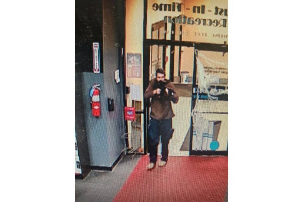 This handout image released on October 25, 2023 by the Androscoggin County Sheriff's Office via Facebook shows the armed suspect in a shooting as law enforcement in Androscoggin County investigate "two active shooter events" in Lewiston, Maine. Photo by Androscoggin County Sheriff's Office/AFP