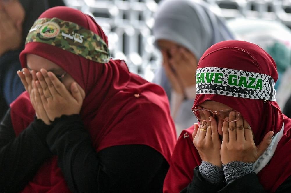 Participants of the Pas Palestine Solidarity 10K rally praying at the KLLC mosque - FILE PIX 