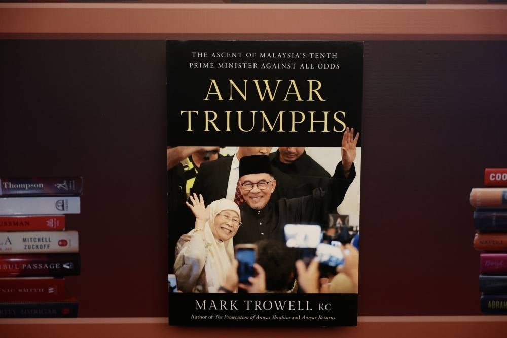 Prime Minister Datuk Seri Anwar Ibrahim today launched the book ‘Anwar Triumphs’, written by prominent Australian criminal lawyer, Mark Trowell KC - BERNAMA