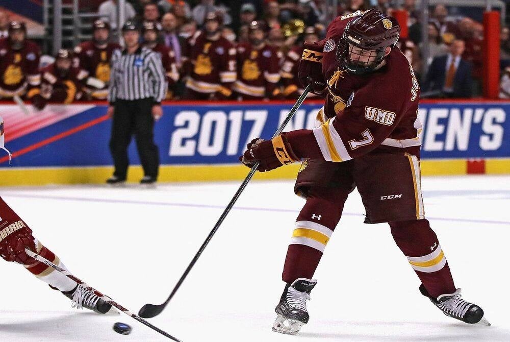 Adam Johnson #7 of the Minnesota-Duluth Bulldogs fires in a shot during the 2017 NCAA Division I men's Ice Hockey Championship game at the United Center in Chicago, Illinois, on April 8, 2017. (Photo by JONATHAN DANIEL / AFP)
