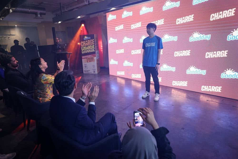 Yap Jian Wei, better known as 'xNova' introduced as the new face of Goodday Charge. Photo by Bernama
