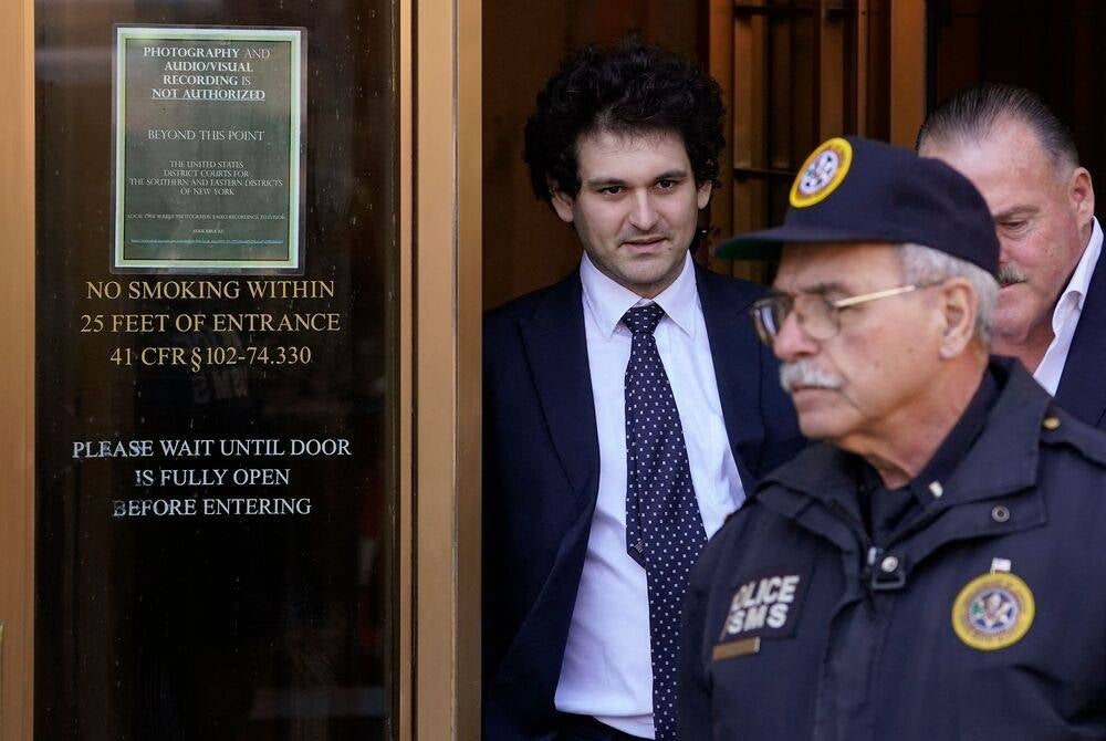 FTX founder Sam Bankman-Fried leaves US Federal Court in New York City on March 30. (Photo by TIMOTHY A. CLARY / AFP)