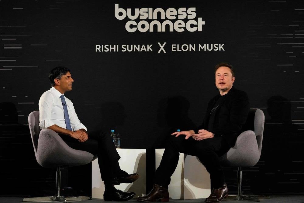 Britain's Prime Minister Rishi Sunak (L) attends an in-conversation event with X (formerly Twitter) CEO Elon Musk (R) in London on Nov 2, following the UK Artificial Intelligence (AI) Safety Summit. (Photo by Kirsty Wigglesworth / POOL / AFP)