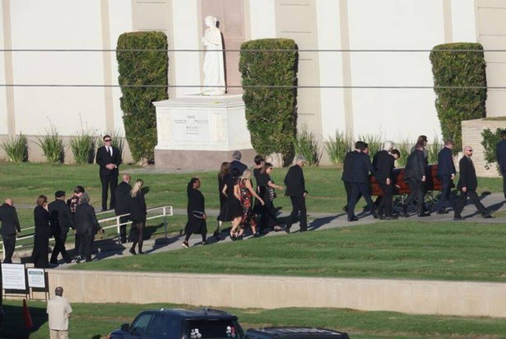 Mourners entering the church for the private ceremony. (Image: Shutterstock / SplashNews.com)