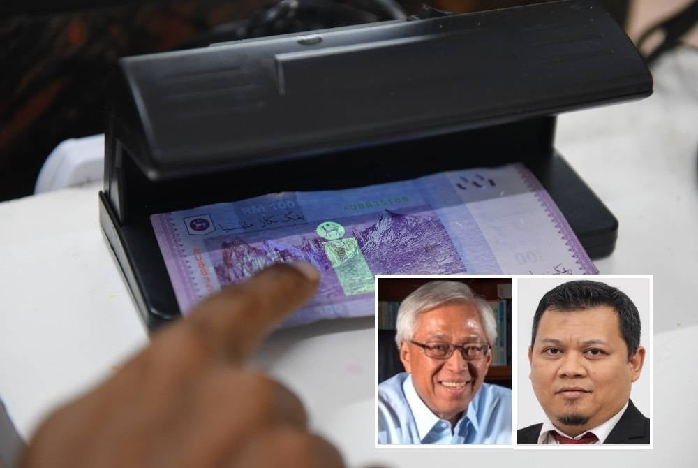 businesses must be able to utilise cashless payment options to reduce the illegal use of counterfeit currency in the country. - (Small picture: Anuwar, Mohd Faisol)