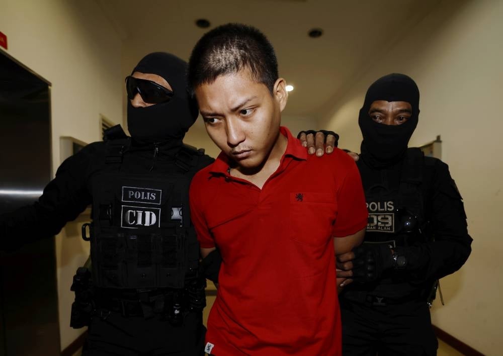 Ahmad Munir Zainuddin, 20, was charged with committing the offence against five girls, aged seven to 11, at a hall in Section 24 here between September and Oct 28. - Photo by Bernama