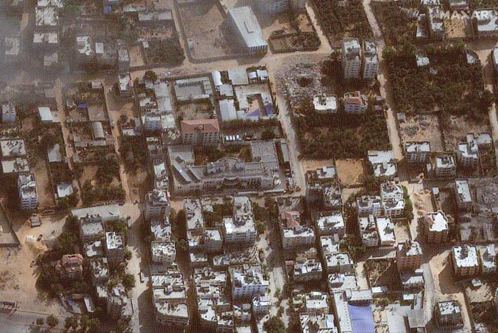 This handout satellite picture released by Maxar Technologies on Nov 12, 2023, shows the damage around the Jordanian field Hospital in Gaza City's western Tal al-Hawa district. - Photo by AFP