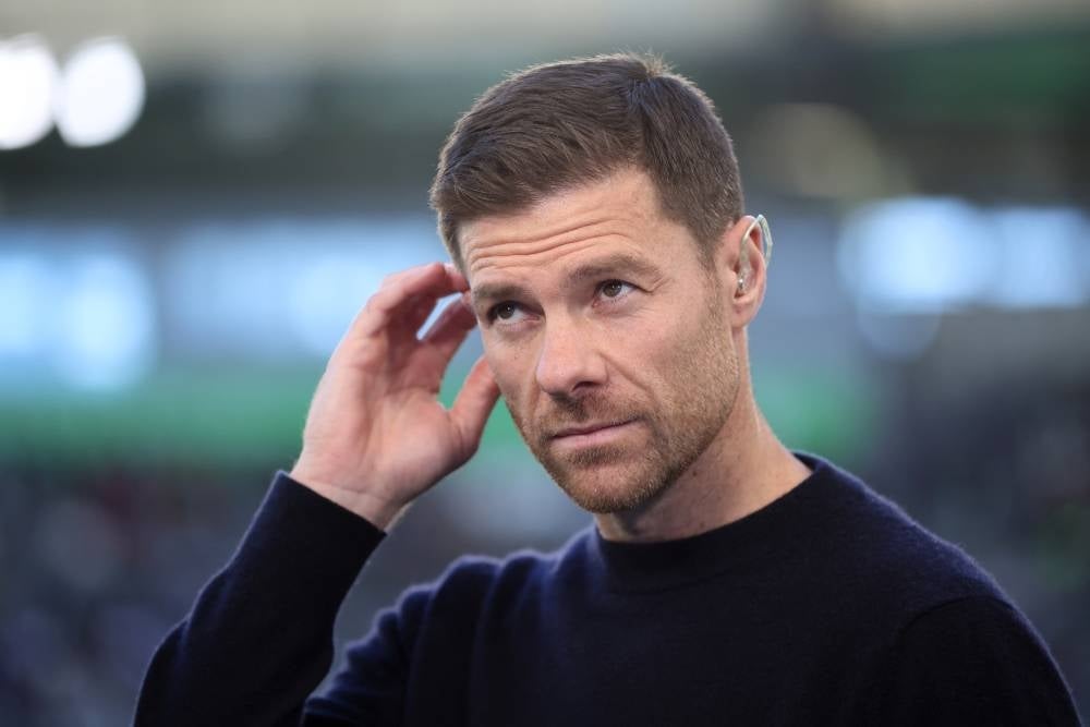 Bayer Leverkusen's Spanish coach Xabi Alonso looks on prior to the German first division Bundesliga football match between VfL Wolfsburg and Bayer Leverkusen in Wolfsburg, northern Germany on Oct 21, 2023. (Photo by Ronny HARTMANN / AFP) 