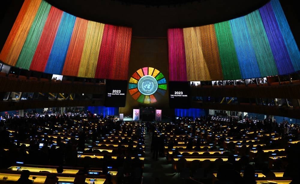 Delegates watch a video presentation during the opening session of the second Sustainable Development Goals (SDG) Summit in New York City on September 18, 2023, ahead of the 78th UN General Assembly. (Photo by TIMOTHY A. CLARY / AFP)