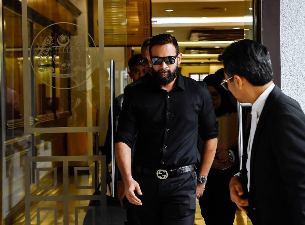 Actor Sharnaaz Ahmad (left) was acquitted and discharged of causing hurt to a security guard at a condominium last year. - Photo by Bernama