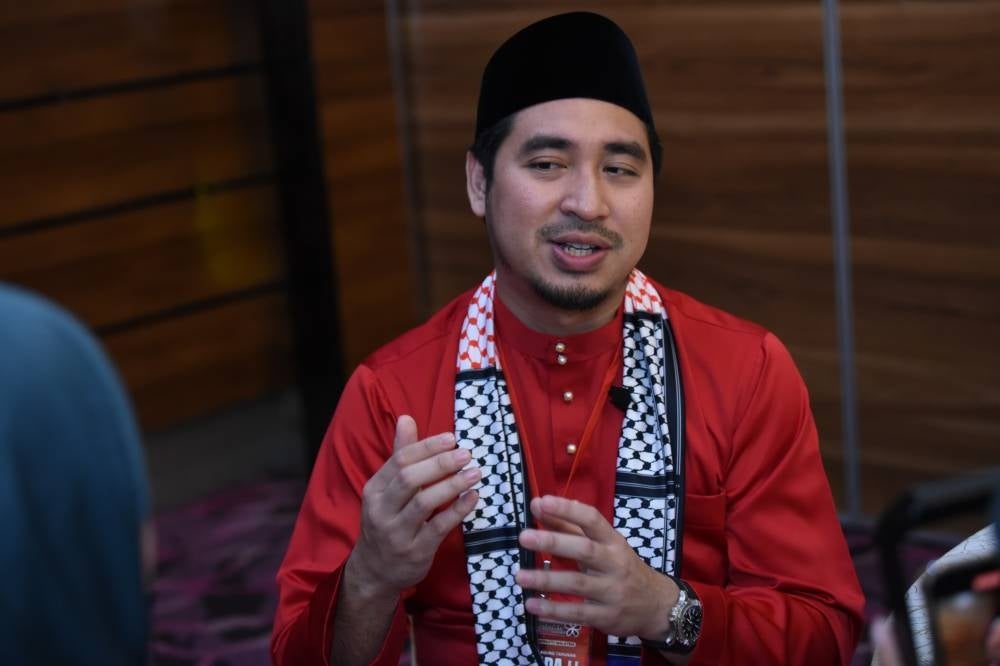 Wan Ahmad Fayhsal during an interview at Bersatu's sixth general assembly. (Rafiq Redzuan) 