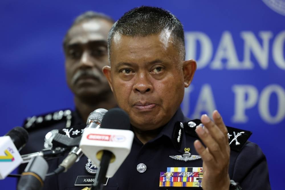 Johor police chief Datuk Kamarul Zaman Mamat during a press conference on the disposal of seized items in drug cases at the Johor police contingent headquarters, today. - Photo by Bernama