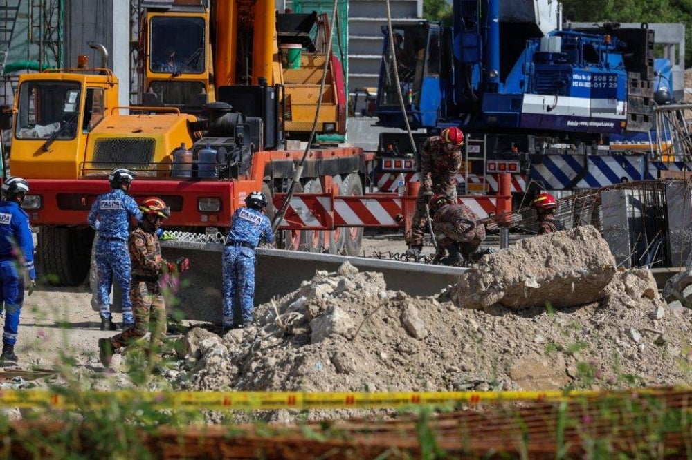 Penang Fire and Rescue Department assistant director (Operations) Khairy Sulaiman said the tracker dogs would only be allowed to enter the area of the rubble after it was confirmed to be safe - BERNAMA