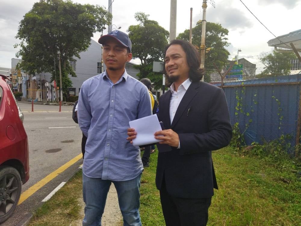 Wahab and his lawyer came forward to file a report at IPD Kajang.