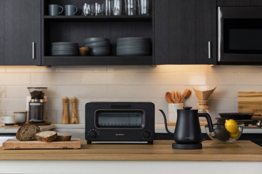 The sleek Balmuda the toaster and the pot in matte black