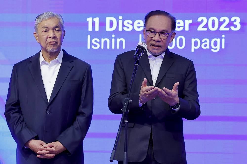 According to Wan Saiful, by appointing Mohamad to a crucial ministerial position, Anwar is indirectly aiding Zahid by preventing Mohamad from posing a significant challenge to Zahid's leadership within Umno. - Photo by Bernama