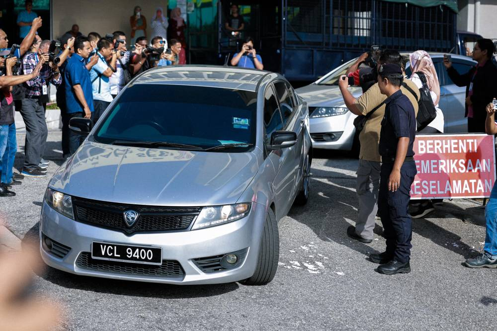 As soon as the proceedings were over, the accused was taken out of the court area accompanied by five police vehicles with heavily tinted mirrors.