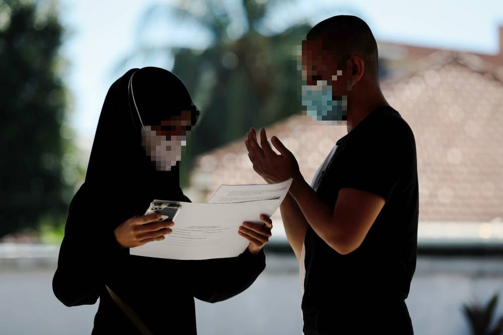Amy is among 11 prisoners who were released through the PBSL programme under the Ihsan Madani initiative and he was welcomed by his younger sibling before returning to their family home in Permatang Pauh. Photo by Bernama