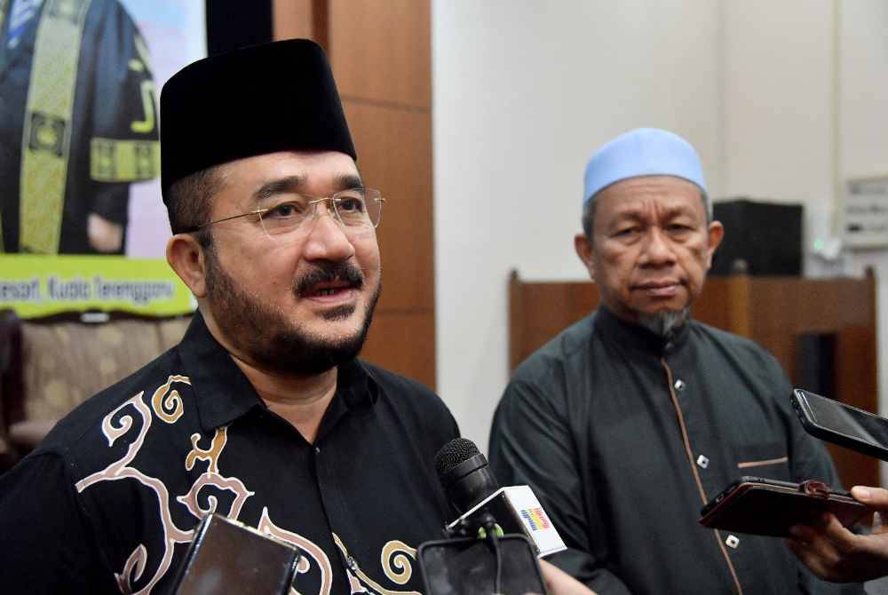 Wan Mohd Zakri (left) and Maliaman (right).