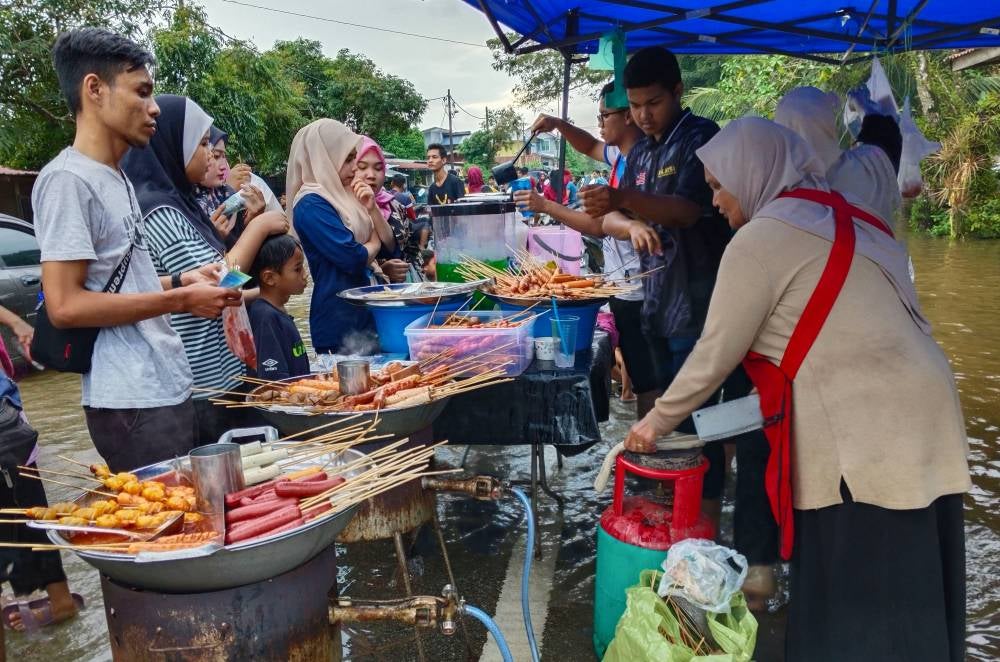 Saida, who is a single mother, said she has been trading for over 10 years and that this is her main source of income. - Photo by Bernama