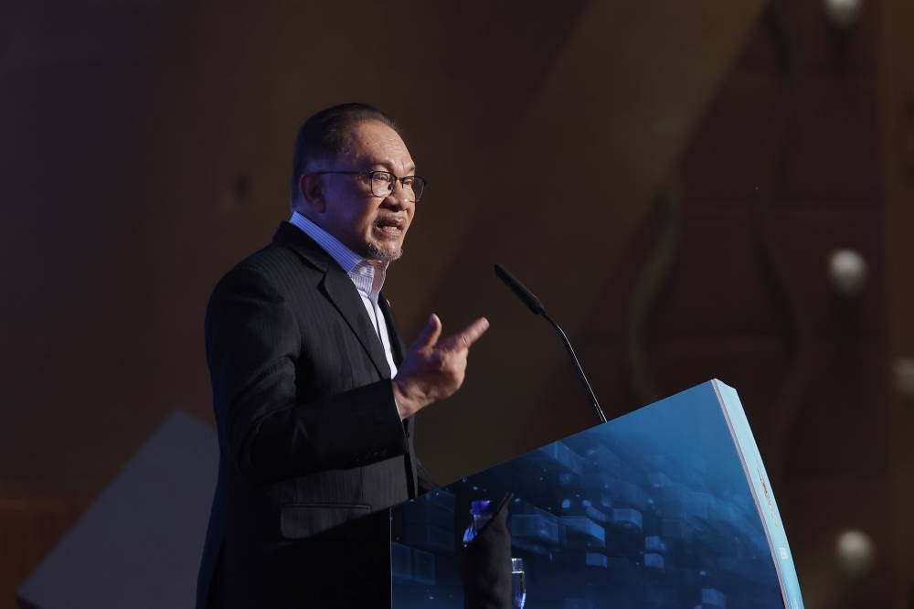 Anwar at the launching of Padu, today. Photo by Bernama