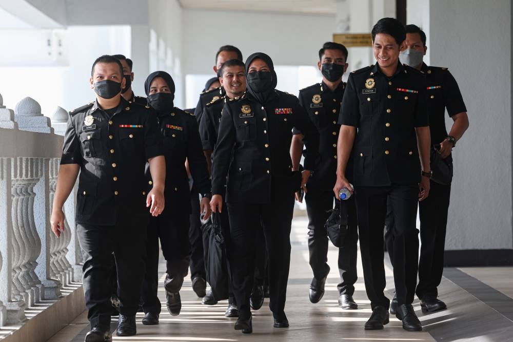 MACC Senior Superintendent Nur Aida Arifin (middle) who is the 49th prosecution witness in Datuk Seri Najib Razak's 1MDB case. - Photo by Bernama
