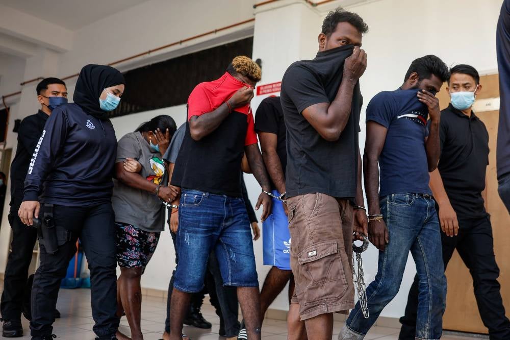 The two siblings, G. Ganong Segaran, 34, and his sister G. Malani, 33, as well as S. Devi, 30, P. Saravanan, 31, and P.K. Vikinesvaran, 20, were charged with murdering S. Ashok, 20, at a house in Jalan Sungai Buaya, Sungai Choh, Rawang last month.