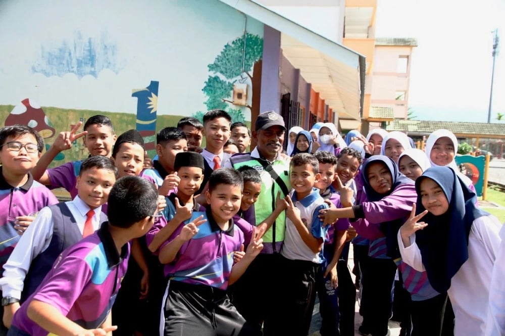 Uncle Kittu back on duty at SK Bandar Baru Putera, Ipoh.