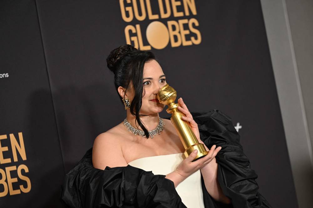 US actress Lily Gladstone poses with the award for Best Performance by a Female Actor in a Motion Picture - Drama for 
