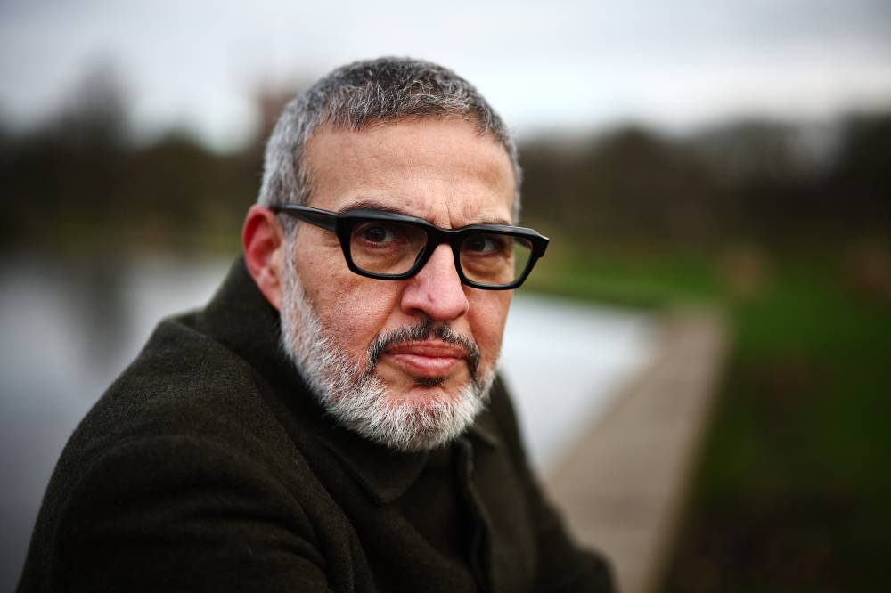 British-Palestinian plastic surgeon specialising in conflict injuries Ghassan Abu Sitta, poses for pictures in Victoria Park, east London, on Jan 7, 2024. - (Photo by HENRY NICHOLLS / AFP)