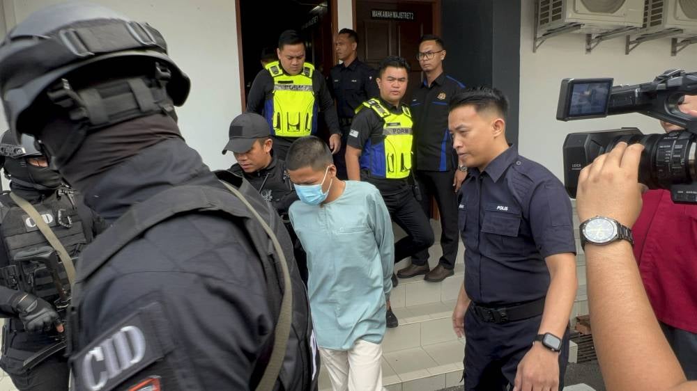 Bella's boyfriend Mohammad Haikal Mahfuz, 25, was charged in a Magistrate's Court today with her murder. - Photo by Bernama