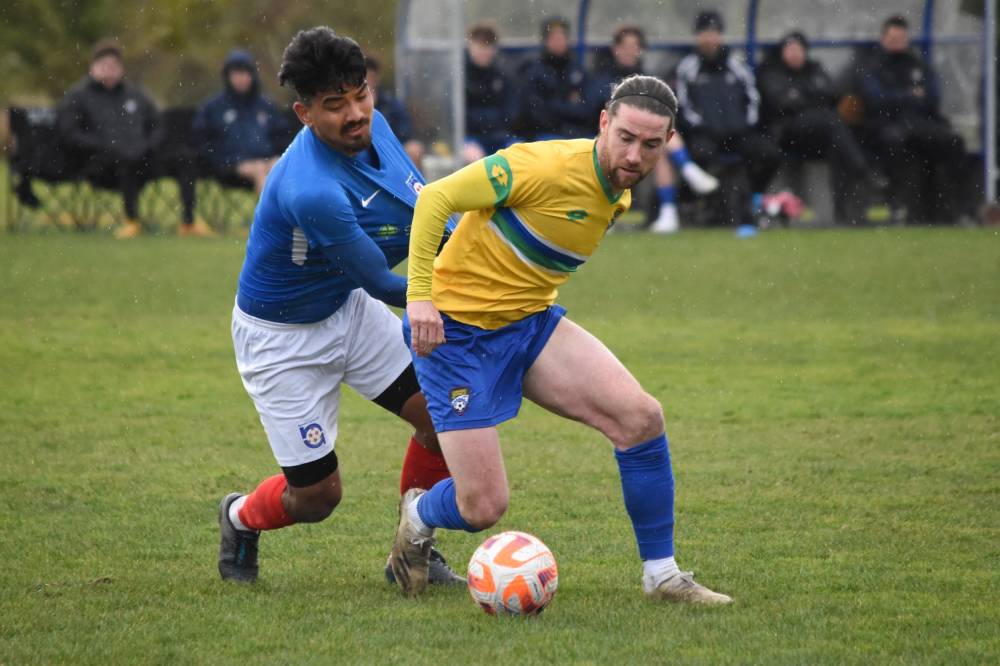 This handout photo taken on August 19, 2023 and received from Mitchell Cozzone on January 26, 2024 shows Cashmere Technical striker Garbhan Coughlan (R) controling the ball during a football match at Tulett Park in Christchurch. Irishman Garbhan Coughlan, a New Zealand-based footballer admitted on January 26, 2024 it feels "unreal" to see his name on a list of top goal-scorers for 2023 alongside stars Cristiano Ronaldo and Erling Haaland. - Photo by AFP