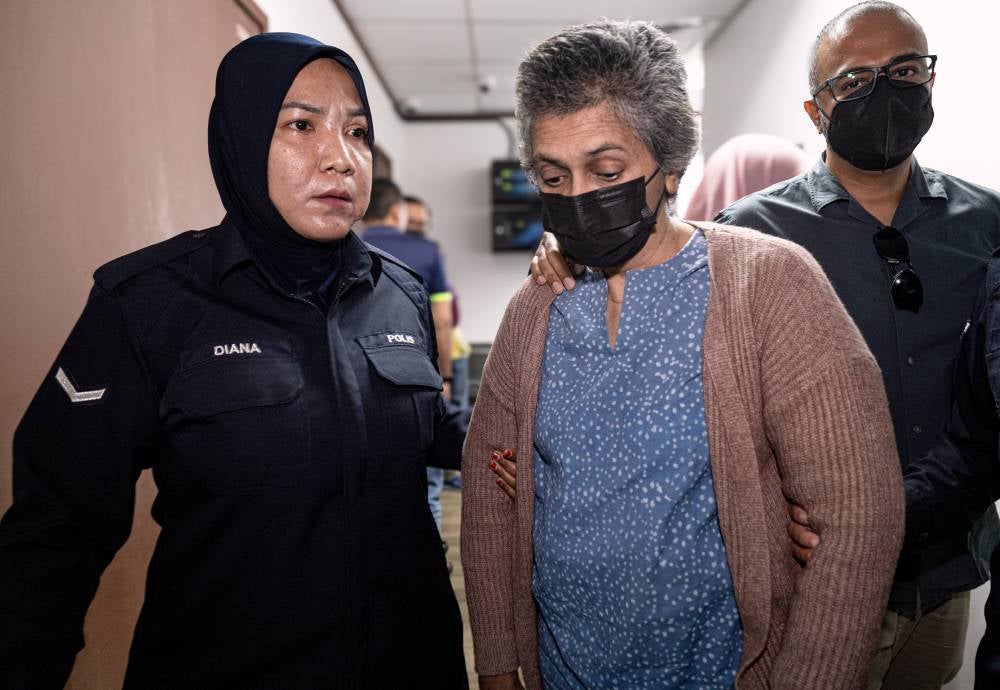 Former nursery school teacher S. Esther Christina was charged again in the Ipoh Sessions Court today with negligence that led to the child's drowning in April last year. - Photo by Bernama