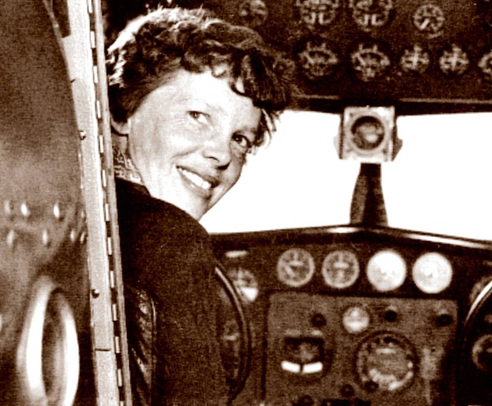 A May 20, 1937 photo shows US aviator Amelia Earhart at the controls of her Lockheed 10 Electra. Photo by Albert Bresnik/ The Paragon Agency/AFP