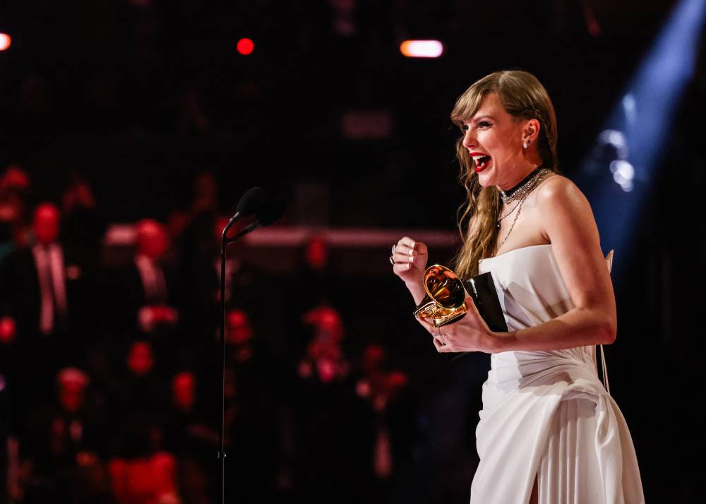 Taylor Swift accepts the Album Of The Year award for "Midnights" during the 66th Grammy Awards on Feb 4, 2024 in Los Angeles, California. - (Photo by John Shearer / AFP)