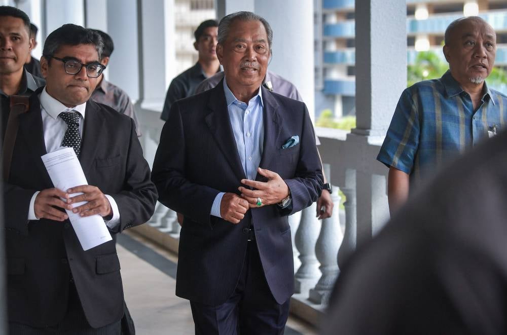 Tan Sri Muhyiddin Yassin at the Kuala Lumpur Courts Complex, today. - Photo by Bernama