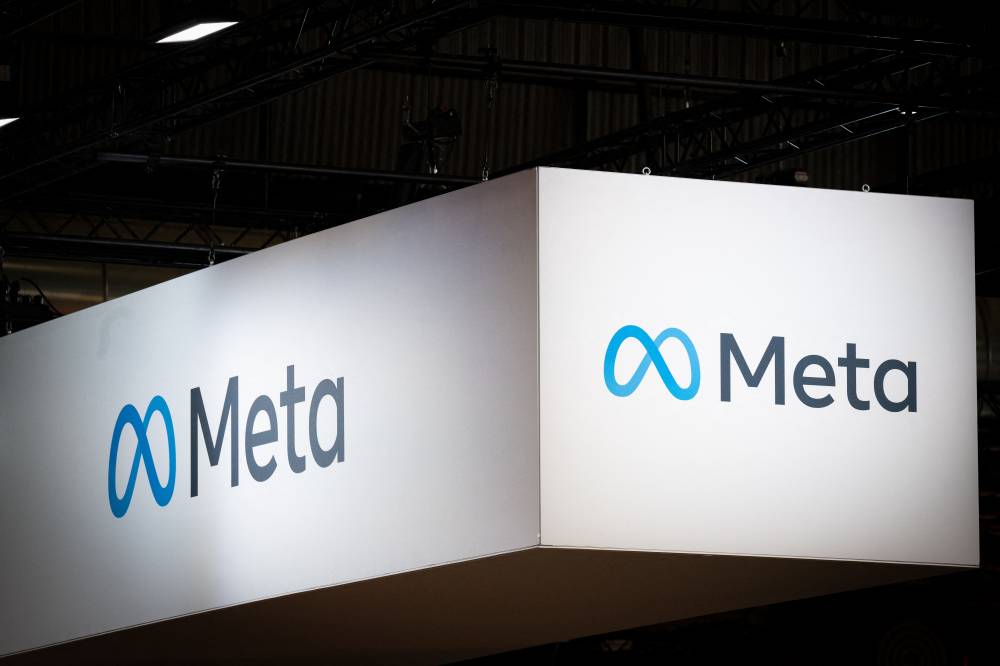 A photo shows US technology Meta group logo during the Vivatech technology startups and innovation fair at the Porte de Versailles exhibition centre in Paris, on June 14, 2023. - (Photo by ALAIN JOCARD / AFP)